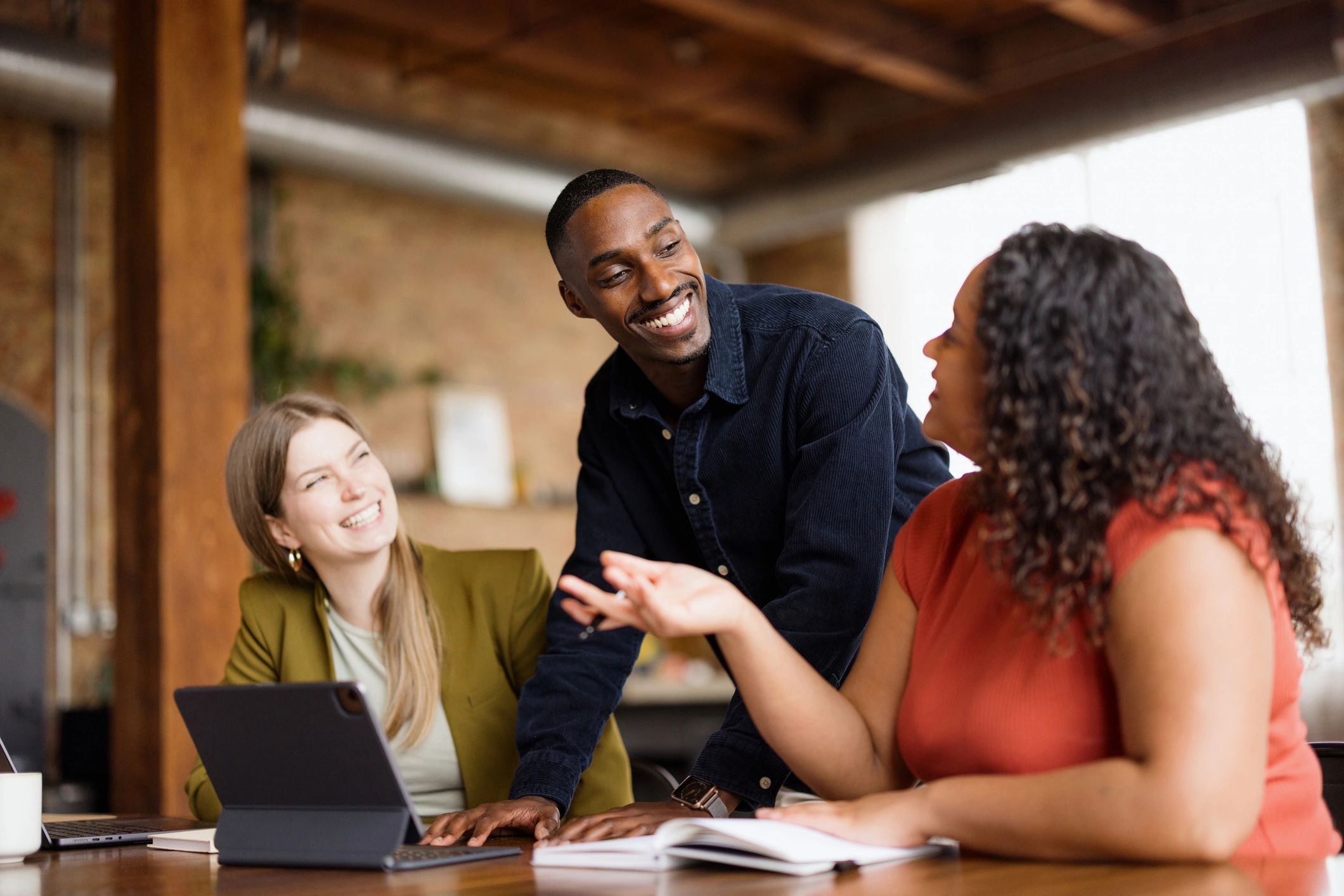 Colleagues collaborating in an office meeting