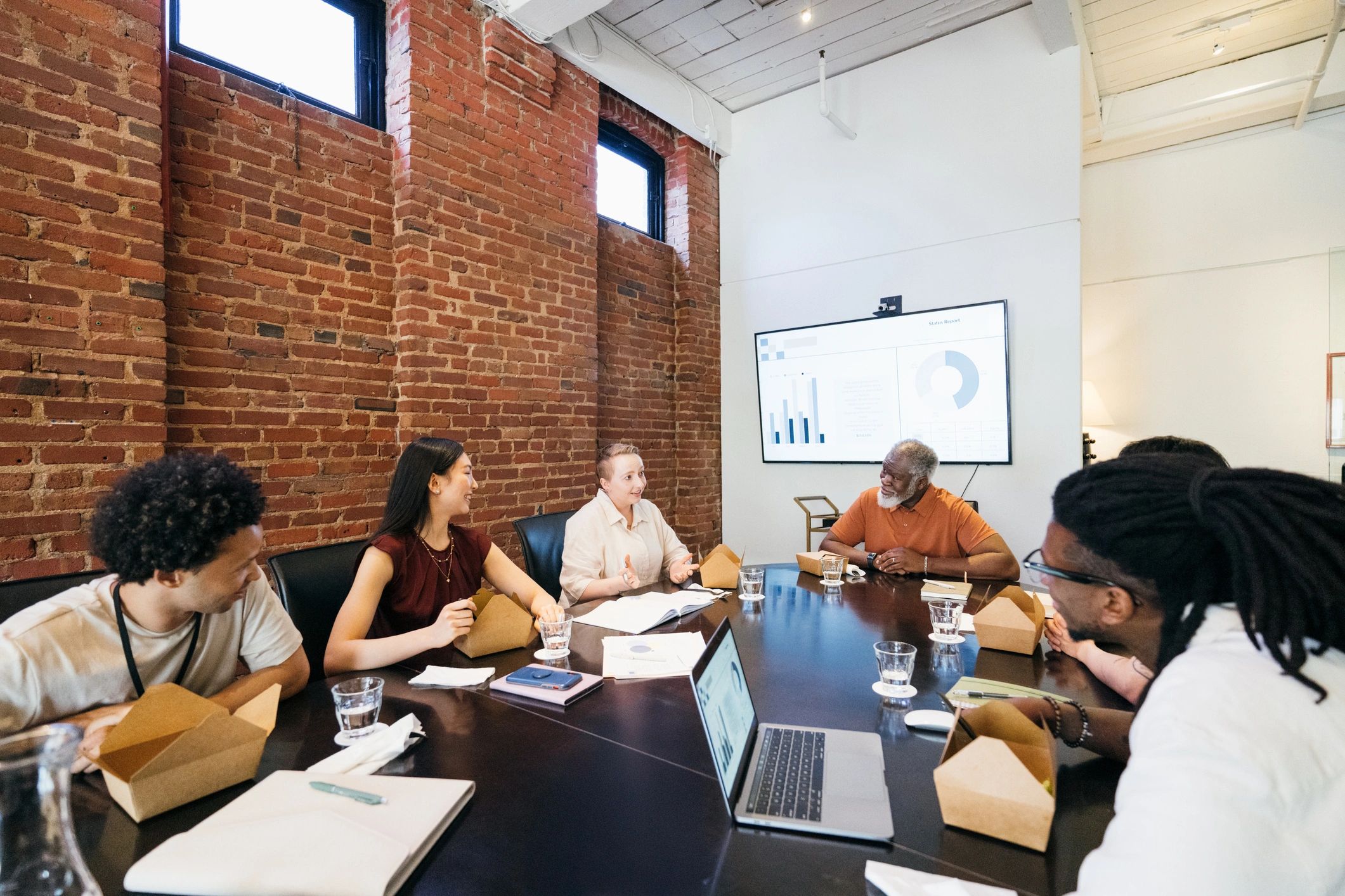 Colleagues collaborating in a boardroom